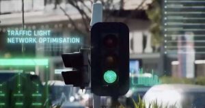 smarter adaptive signals | PROCons Traffic light with a glowing green signal and holographic text 'TRAFFIC LIGHT NETWORK OPTIMISATION' in the foreground.